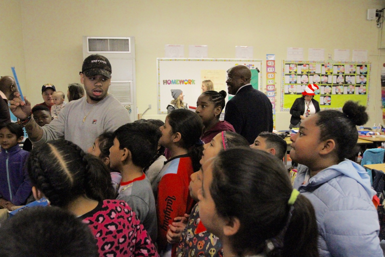 Mack Wilds and students